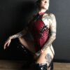 Dark red lace up faux leather body. The lacing goes from front to back.